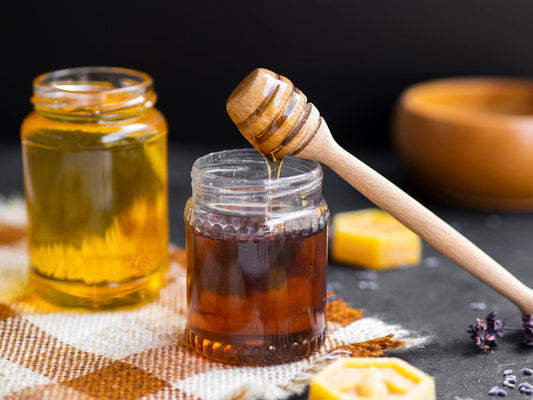dripping honey glass jar