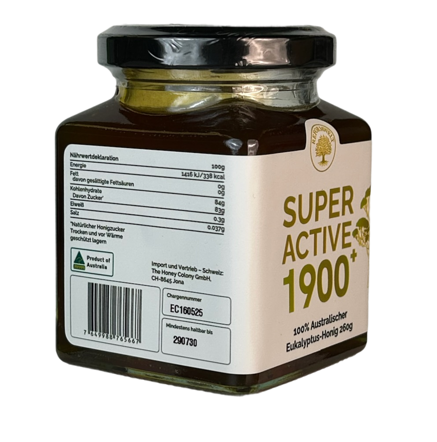 Glass jar of Super Active 1900+ eucalyptus honey shown at an angle, with a cream label and black lid on a transparent background.